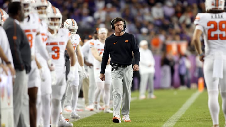 Nov 9, 2024; Fort Worth, Texas, USA; Oklahoma State Cowboys head coach Mike Gundy walks down the sidelines  in the game against the TCU Horned Frogs at Amon G. Carter Stadium. Mandatory Credit: Tim Heitman-Imagn Images