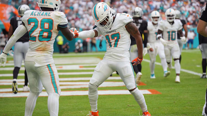 Miami Dolphins wide receiver Jaylen Waddle (17) celebrates his fourth-quarter touchdown against the Las Vegas Raiders with running back De'Von Achane at Hard Rock Stadium. Miami Dolphins wide receiver Jaylen Waddle (17) celebrates his fourth-quarter touchdown against the Las Vegas Raiders with running back De'Von Achane at Hard Rock Stadium.