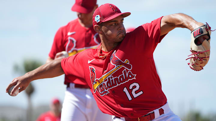 Feb 15, 2023; Jupiter, FL, USA;  St. Louis Cardinals relief pitcher Jordan Hicks (12) warms-up
