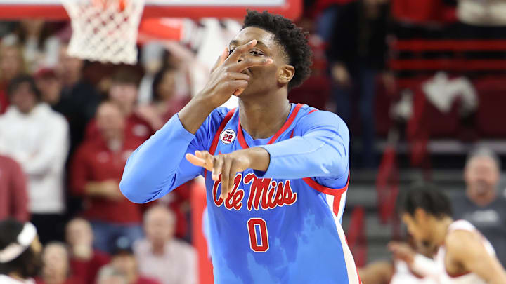 Jan 8, 2025; Fayetteville, Arkansas, USA; Ole Miss Rebels forward Malik Dia (0) reacts after making a there point shot in the second half against the Arkansas Razorbacks at Bud Walton Arena. Ole Miss won 73-66. Mandatory Credit: Nelson Chenault-Imagn Images
