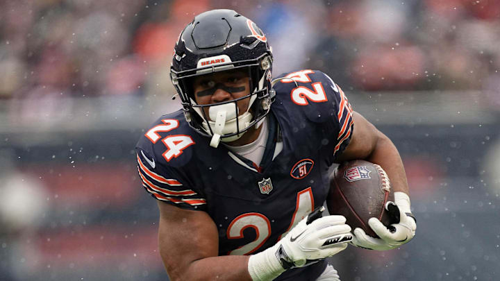 Dec 31, 2023; Chicago, Illinois, USA;  Chicago Bears running back Khalil Herbert (24) runs with the ball against the Atlanta Falcons at Soldier Field. Mandatory Credit: Jamie Sabau-Imagn Images