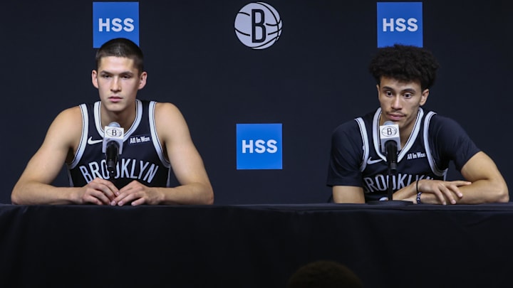 Sep 23, 2025; Brooklyn, NY, USA;  Brooklyn Nets guards Egor Demin (8) and Nolan Traore (88) speak at Media Day. Mandatory Credit: Wendell Cruz-Imagn Images