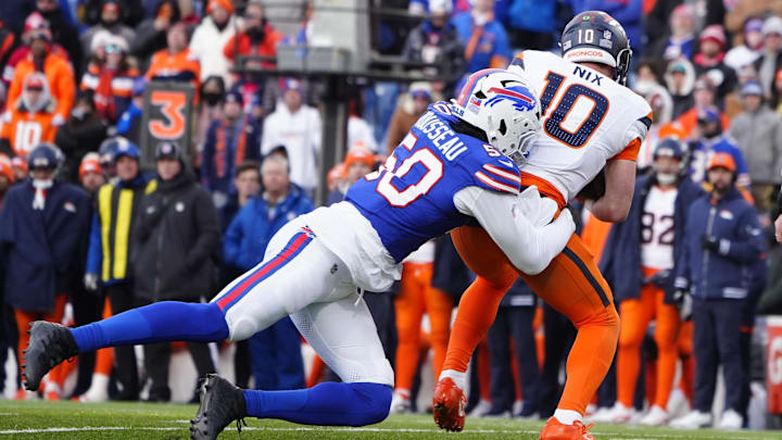 Jan 12, 2025; Orchard Park, New York, USA; Buffalo Bills defensive end Greg Rousseau (50) sacks Denver Broncos quarterback Bo Nix (10) during the fourth quarter in an AFC wild card game at Highmark Stadium. Jan 12, 2025; Orchard Park, New York, USA; Buffalo Bills defensive end Greg Rousseau (50) sacks Denver Broncos quarterback Bo Nix (10) during the fourth quarter in an AFC wild card game at Highmark Stadium.