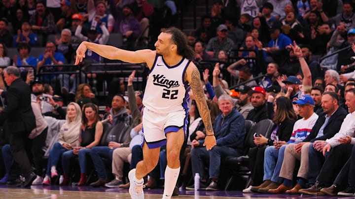Mar 19, 2025; Sacramento, California, USA; Sacramento Kings guard Devin Carter (22) gestures after a three point basket against the Cleveland Cavaliers during the third quarter at Golden 1 Center. Mandatory Credit: Kelley L Cox-Imagn Images