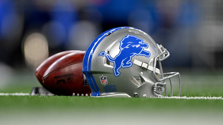 Jan 14, 2024; Detroit, Michigan, USA;  Footballs and a Detroit Lions helmet before a 2024 NFC wild card game between the Lions and Los Angeles Rams at Ford Field. Mandatory Credit: Lon Horwedel-Imagn Images