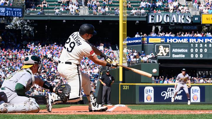 Sep 6, 2026; Seattle, Washington, USA; Seattle Mariners designated hitter Cal Raleigh (29) hits a RBI single against the Athletics during the fourth inning at T-Mobile Park. Mandatory Credit: Steven Bisig-Imagn Images Sep 6, 2026; Seattle, Washington, USA; Seattle Mariners designated hitter Cal Raleigh (29) hits a RBI single against the Athletics during the fourth inning at T-Mobile Park. Mandatory Credit: Steven Bisig-Imagn Images