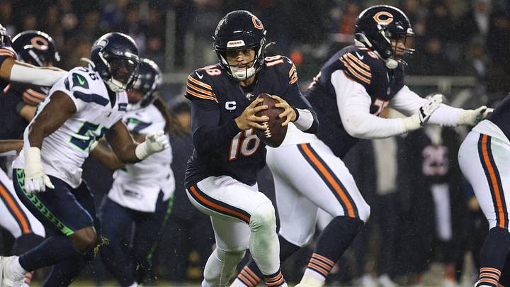 Dec 26, 2024; Chicago, Illinois, USA; Chicago Bears quarterback Caleb Williams (18) rolls out of the pocket during the third quarter against the Seattle Seahawks at Soldier Field. Mandatory Credit: Talia Sprague-Imagn Images Dec 26, 2024; Chicago, Illinois, USA; Chicago Bears quarterback Caleb Williams (18) rolls out of the pocket during the third quarter against the Seattle Seahawks at Soldier Field. Mandatory Credit: Talia Sprague-Imagn Images