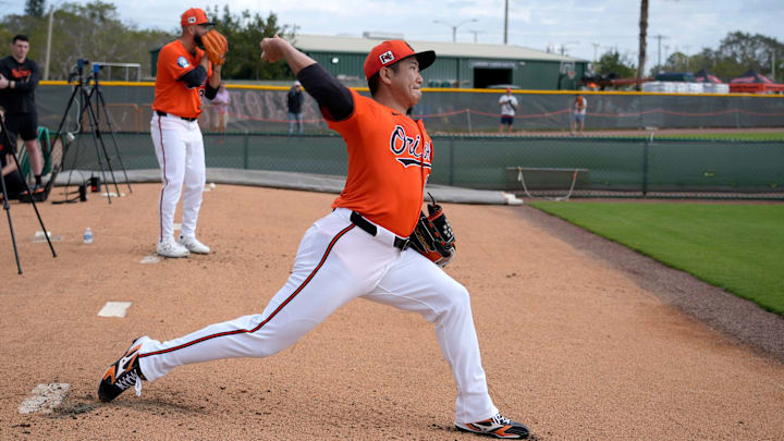 Orioles right-hand pitcher Tomoyuki Sugano throws a pitch during his session in the bullpen on Tuesday. The Baltimore Orioles held their first full-squad workout of the 2025 spring training season on Tuesday, Feb. 18th in Sarasota, Florida.