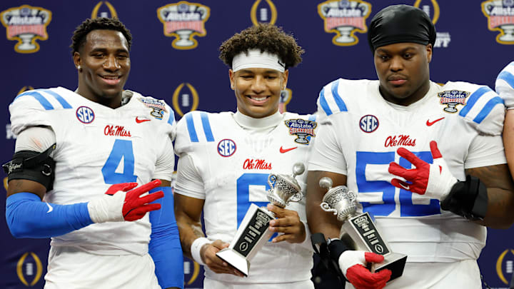 Jan 1, 2026; New Orleans, LA, USA; Mississippi Rebels linebacker Suntarine Perkins (4), quarterback Trinidad Chambliss (6) and defensive tackle Will Echoles (52) pose for a photo after the 2026 Sugar Bowl and quarterfinal game of the College Football Playoff against the Georgia Bulldogs at Caesars Superdome. Mandatory Credit: Amber Searls-Imagn Images