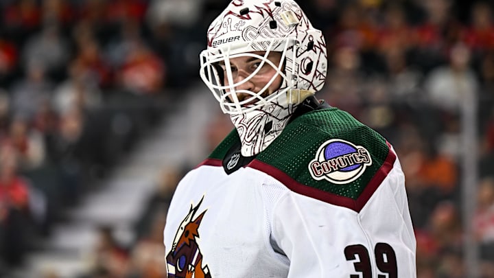 Apr 14, 2024; Calgary, Alberta, CAN; Arizona Coyotes goaltender Connor Ingram (39) looks on against the Calgary Flames during the third period at Scotiabank Saddledome. Mandatory Credit: Brett Holmes-Imagn Images