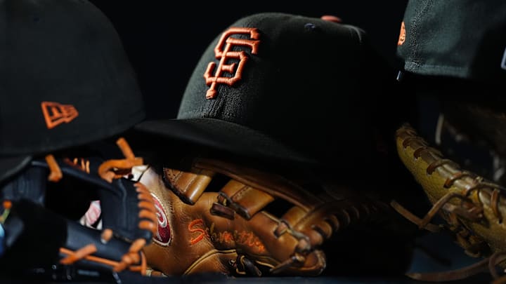 General view of San Francisco Giants caps and gloves.