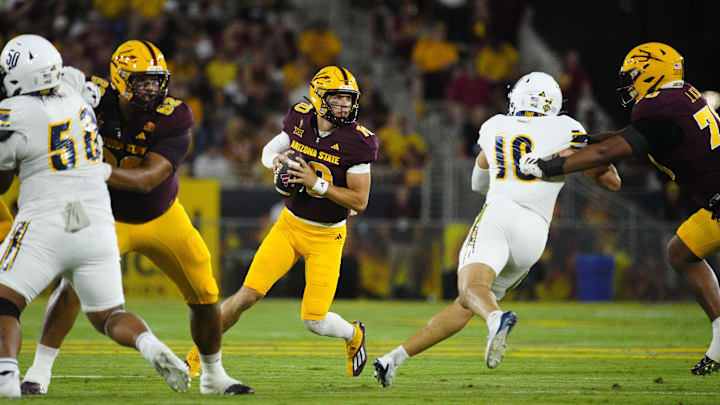 Arizona State quarterback Sam Leavitt (10) looks for a receiver against NAU during a game at Mountain America Stadium in Tempe on Aug. 30, 2025.