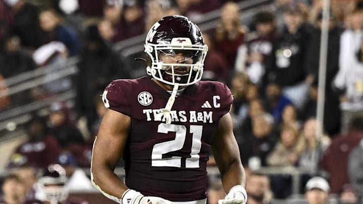 Nov 30, 2024; College Station, Texas, USA; Texas A&M Aggies linebacker Taurean York (21) reacts against the Texas Longhorns during the second half. The Longhorns defeated the Aggies 17-7 at Kyle Field. Mandatory Credit: Maria Lysaker-Imagn Images  