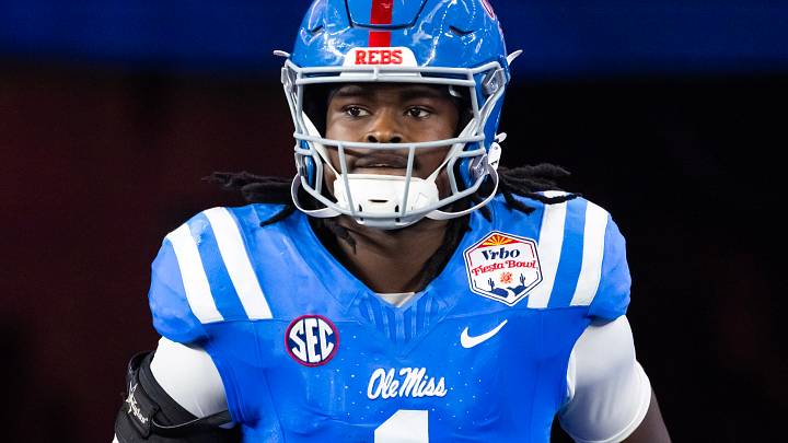 Jan 8, 2026; Glendale, AZ, USA; Mississippi Rebels linebacker Princewill Umanmielen (1) against the Miami Hurricanes during the 2026 Fiesta Bowl and semifinal game of the College Football Playoff at State Farm Stadium. Mandatory Credit: Mark J. Rebilas-Imagn Images Jan 8, 2026; Glendale, AZ, USA; Mississippi Rebels linebacker Princewill Umanmielen (1) against the Miami Hurricanes during the 2026 Fiesta Bowl and semifinal game of the College Football Playoff at State Farm Stadium. Mandatory Credit: Mark J. Rebilas-Imagn Images
