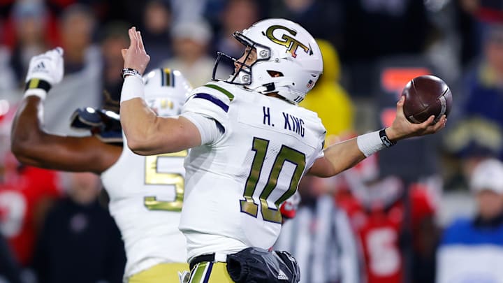 Haynes King #10 of the Georgia Tech Yellow Jackets passes during the first quarter against the Georgia Bulldogs at Bobby Dodd Stadium on November 25, 2023 in Atlanta, Georgia.