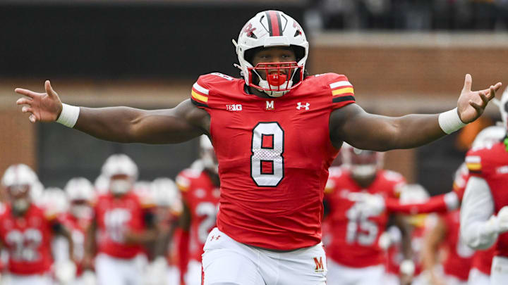 Sep 7, 2024; College Park, Maryland, USA;  Maryland Terrapins defensive lineman Jordan Phillips (8) takes the field before the game against the Michigan State Spartans at SECU Stadium.