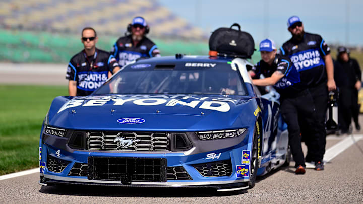 NASCAR will re-evaluate part of its Damaged Vehicle Policy after Josh Berry was forced out of Sunday's race at Kansas because he couldn't make it back to the pits on four flat tires. NASCAR will re-evaluate part of its Damaged Vehicle Policy after Josh Berry was forced out of Sunday's race at Kansas because he couldn't make it back to the pits on four flat tires.