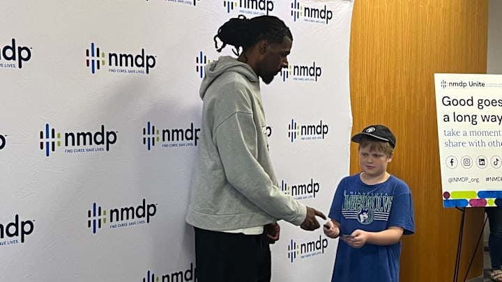 Naz Reid signs autographs with fans at a NMDP Unite event for World Marrow Donor Day on Sept, 21, 2024, in Minneapolis. 