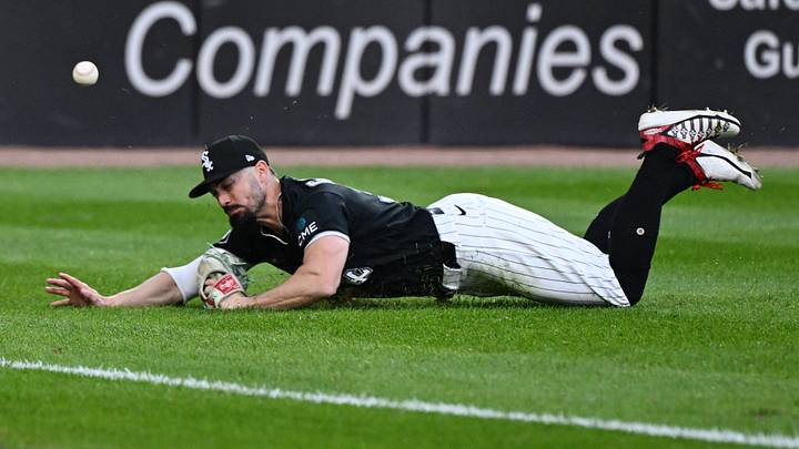 Oct 7, 2026; Chicago, Illinois, USA;  Chicago White Sox left fielder Randal Grichuk (34) can not catch an RBI triple hit by Cleveland Guardians third baseman Jose Ramirez (not pictured) during the eighth inning in game three of the ALDS for the 2026 MLB Playoffs at Rate Field.  Mandatory Credit: Matt Marton-Imagn Images