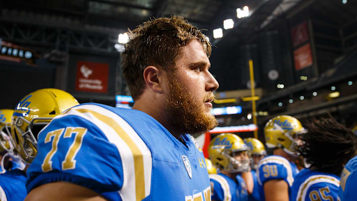 Dec 26, 2017; Phoenix, AZ, USA; UCLA Bruins offensive lineman Kolton Miller (77) against the Kansas State Wildcats in the 2017 Cactus Bowl at Chase Field. Mandatory Credit: Mark J. Rebilas-Imagn Images Dec 26, 2017; Phoenix, AZ, USA; UCLA Bruins offensive lineman Kolton Miller (77) against the Kansas State Wildcats in the 2017 Cactus Bowl at Chase Field. Mandatory Credit: Mark J. Rebilas-Imagn Images