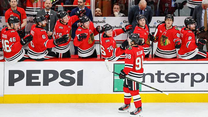 Mar 22, 2026; Chicago, Illinois, USA; Chicago Blackhawks center Connor Bedard (98) celebrates with teammates after scoring against the Nashville Predators during the second period at United Center. Mandatory Credit: Kamil Krzaczynski-Imagn Images