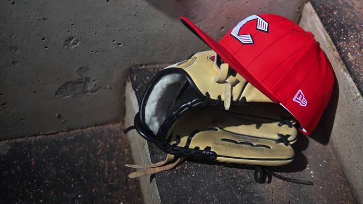 Apr 11, 2026; Cincinnati, Ohio, USA; A view of an official Cincinnati Reds hat on the dugout steps during the game against the Los Angeles Angels at Great American Ball Park. Mandatory Credit: Aaron Doster-Imagn Images Apr 11, 2026; Cincinnati, Ohio, USA; A view of an official Cincinnati Reds hat on the dugout steps during the game against the Los Angeles Angels at Great American Ball Park. Mandatory Credit: Aaron Doster-Imagn Images