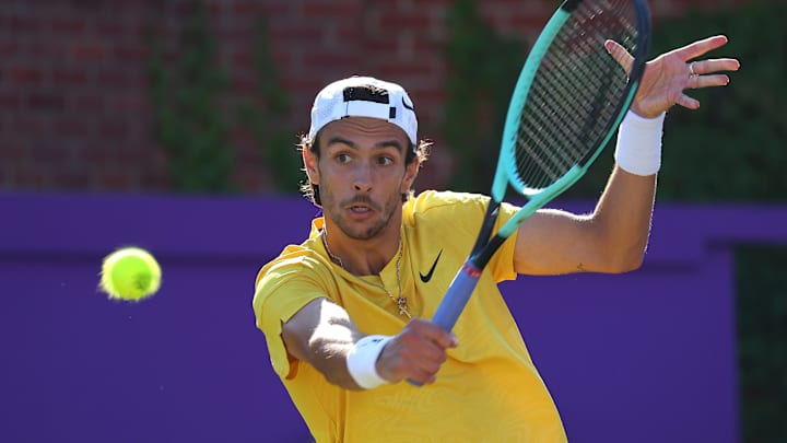 Lorenzo Musetti with a backhand shot to Brandon Nakashima at the 2024 Cinch Championships.