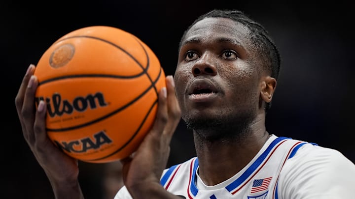 Jan 31, 2026; Lawrence, Kansas, USA; Kansas Jayhawks forward Flory Bidunga (40) shoots a free throw during the second half against the BYU Cougars at Mizzou Arena. Mandatory Credit: Jay Biggerstaff-Imagn Images