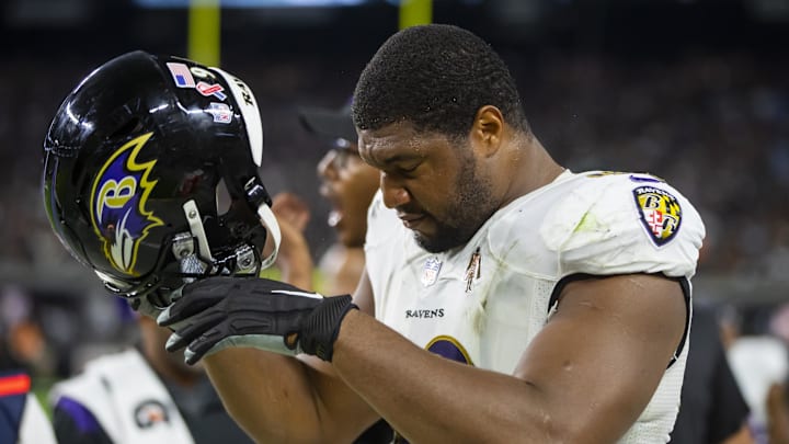Sep 13, 2021; Paradise, Nevada, USA; Baltimore Ravens defensive end Calais Campbell (93) takes off his helmet against the Las Vegas Raiders during Monday Night Football at Allegiant Stadium. Mandatory Credit: Mark J. Rebilas-USA TODAY Sports Sep 13, 2021; Paradise, Nevada, USA; Baltimore Ravens defensive end Calais Campbell (93) takes off his helmet against the Las Vegas Raiders during Monday Night Football at Allegiant Stadium. Mandatory Credit: Mark J. Rebilas-USA TODAY Sports