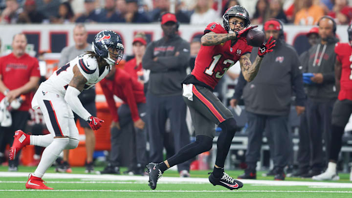Sep 15, 2025; Houston, Texas, USA;  Tampa Bay Buccaneers wide receiver Mike Evans (13) makes a catch during the first quarter against the Houston Texans at NRG Stadium. Mandatory Credit: Troy Taormina-Imagn Images