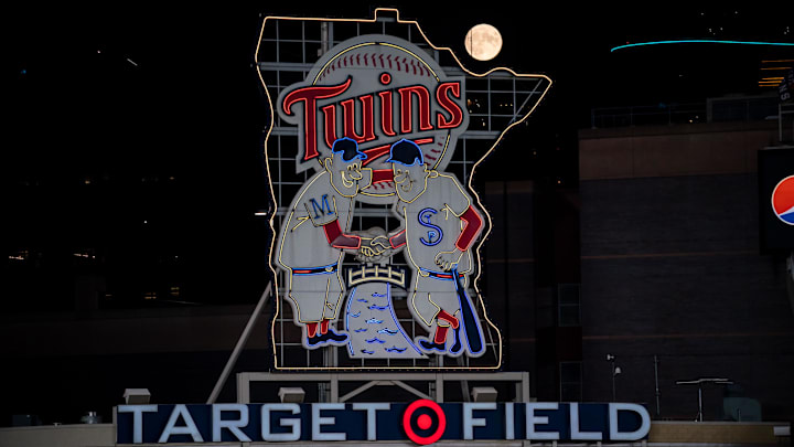 Sep 1, 2020; Minneapolis, Minnesota, USA; A full moon rises over the Minnesota Twins logo in a game between the Minnesota Twins and Chicago White Sox at Target Field. 