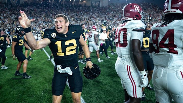 Vanderbilt Commodores quarterback Brennan Storer (12) celebrates after knocking off the Alabama Crimson Tide 40-35 at Vanderbilt Stadium in Nashville, Tenn., Saturday, Oct. 5, 2024.