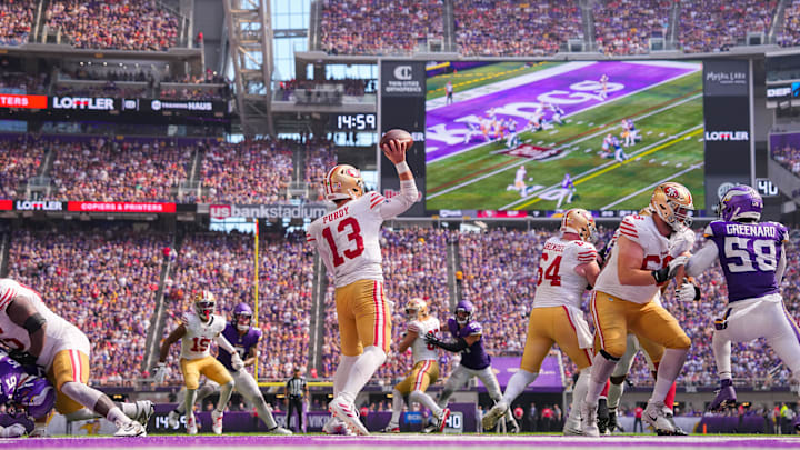 Sep 15, 2024; Minneapolis, Minnesota, USA; San Francisco 49ers quarterback Brock Purdy (13) passes against the Minnesota Vikings in the fourth quarter at U.S. Bank Stadium.