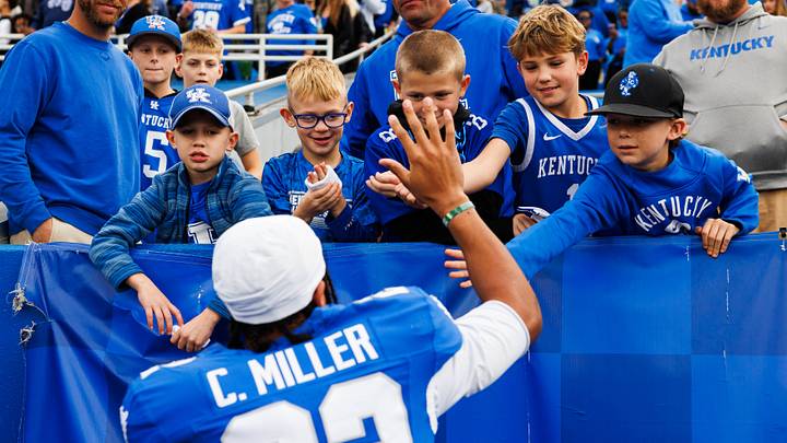 Nov 15, 2025; Lexington, Kentucky, USA; Kentucky Wildcats wide receiver Cameron Miller (22) fives fans after the game against the Tennessee Tech Golden Eagles at Kroger Field. Mandatory Credit: Jordan Prather-Imagn Images Nov 15, 2025; Lexington, Kentucky, USA; Kentucky Wildcats wide receiver Cameron Miller (22) fives fans after the game against the Tennessee Tech Golden Eagles at Kroger Field. Mandatory Credit: Jordan Prather-Imagn Images