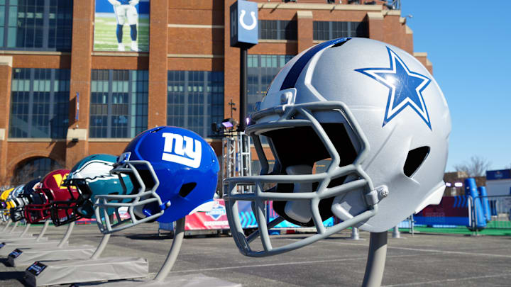 Feb 28, 2024; Indianapolis, IN, USA; A general view of large Dallas Cowboys and New York Giants helmets at the NFL Scouting Combine Experience at Lucas Oil Stadium. Mandatory Credit: Kirby Lee-Imagn Images Feb 28, 2024; Indianapolis, IN, USA; A general view of large Dallas Cowboys and New York Giants helmets at the NFL Scouting Combine Experience at Lucas Oil Stadium. Mandatory Credit: Kirby Lee-Imagn Images