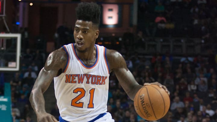Dec 5, 2014; Charlotte, NC, USA; New York Knicks guard Iman Shumpert (21) drives to the basket during the first half against the New York Knicks at Time Warner Cable Arena. Mandatory Credit: Jeremy Brevard-Imagn Images