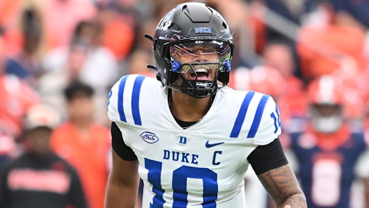 Sep 27, 2025; Syracuse, New York, USA; Duke Blue Devils quarterback Darian Mensah (10) calls a play in the first quarter against the Syracuse Orange at the JMA Wireless Dome. Mandatory Credit: Mark Konezny-Imagn Images Sep 27, 2025; Syracuse, New York, USA; Duke Blue Devils quarterback Darian Mensah (10) calls a play in the first quarter against the Syracuse Orange at the JMA Wireless Dome. Mandatory Credit: Mark Konezny-Imagn Images