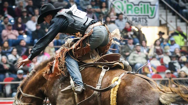 Brody Cress rides bronc named Blonde Lizard during the San Angelo Stock Show & Rodeo. 