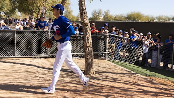 Feb 25, 2025; Phoenix, Arizona, USA; Los Angeles Dodgers pitcher Shohei Ohtani (17) during workouts at Camelback Ranch-Glendale. Mandatory Credit: Mark J. Rebilas-Imagn Images