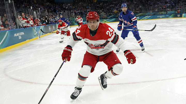 Feb 14, 2026; Milan, Italy; Brock Faber of United States in action with Nikolaj Ehlers of Denmark in men's ice hockey group C play during the Milano Cortina 2026 Olympic Winter Games at Milano Santagiulia Ice Hockey Arena. Mandatory Credit: Geoff Burke-Imagn Images Feb 14, 2026; Milan, Italy; Brock Faber of United States in action with Nikolaj Ehlers of Denmark in men's ice hockey group C play during the Milano Cortina 2026 Olympic Winter Games at Milano Santagiulia Ice Hockey Arena. Mandatory Credit: Geoff Burke-Imagn Images