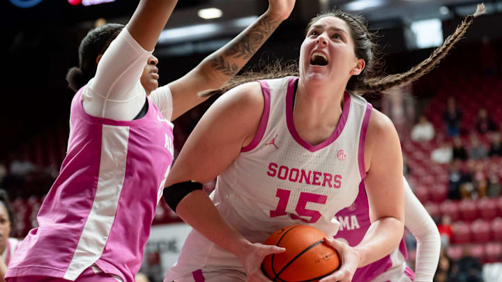 Oklahoma center Raegan Beers (15) works for a shot againt Alabama forward Essence Cody (21) at Coleman Coliseum on Feb. 15. Sunday, Beers helped the Sooners to a win over Tennessee.