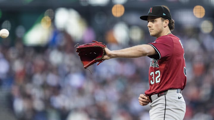 May 13, 2025; San Francisco, California, USA; Arizona Diamondbacks starting pitcher Brandon Pfaadt (32) prepares to throw against the San Francisco Giants during the first inning at Oracle Park. Mandatory Credit: John Hefti-Imagn Images May 13, 2025; San Francisco, California, USA; Arizona Diamondbacks starting pitcher Brandon Pfaadt (32) prepares to throw against the San Francisco Giants during the first inning at Oracle Park. Mandatory Credit: John Hefti-Imagn Images