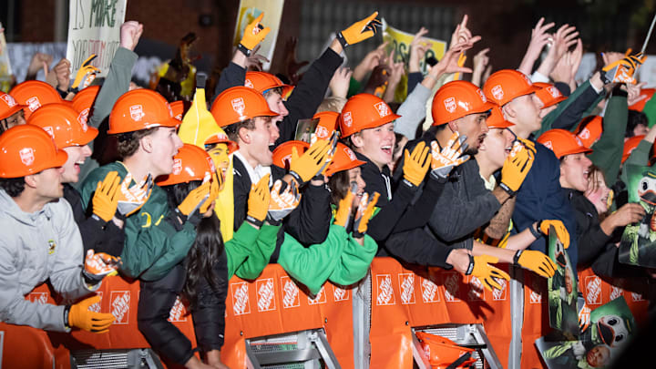 Fans cheer ahead of ESPN’s “College GameDay” on the campus of the University of Oregon on Oct. 11, 2025, in Eugene, Oregon.