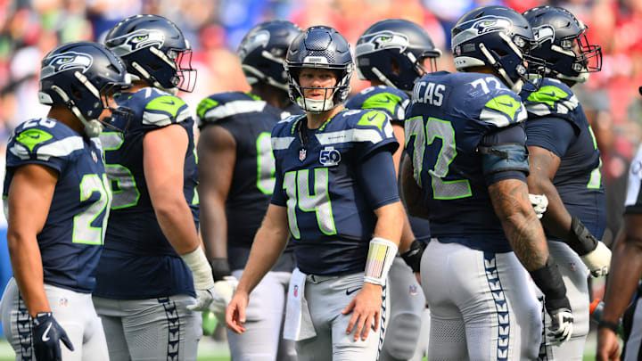 Sep 7, 2025; Seattle, Washington, USA; Seattle Seahawks quarterback Sam Darnold (14) during a TV timeout during the second half against San Francisco 49ers at Lumen Field.