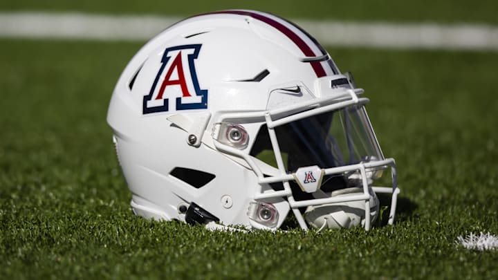 Nov 25, 2022; Tucson, Arizona, USA; Detailed view of an Arizona Wildcats helmet on the field during the Territorial Cup at Arizona Stadium. Mandatory Credit: Mark J. Rebilas-Imagn Images
