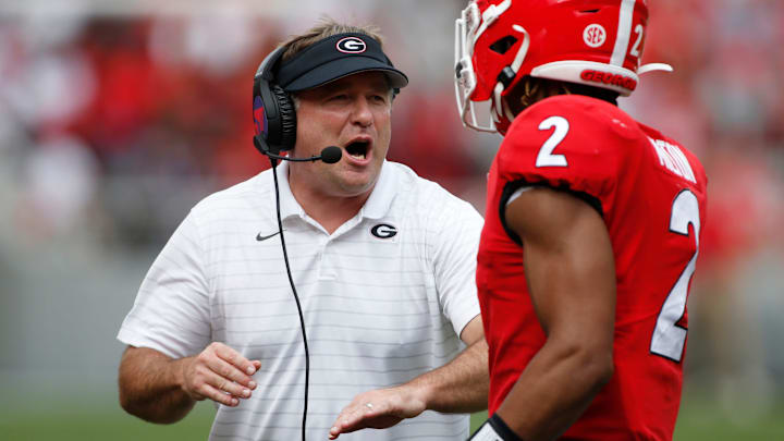 Georgia coach Kirby Smart celebrates with Georgia running back Kendall Milton (2) after he scored a touchdown during the first half of an NCAA college football game between Arkansas and Georgia in Athens, Ga., on Saturday, Oct. 2, 2021.

News Joshua L Jones