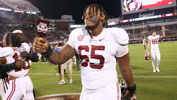 Alabama Crimson Tide offensive lineman JC Latham (65)