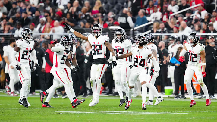 Dec 16, 2024; Paradise, Nevada, USA; Atlanta Falcons cornerback Kevin King (32) celebrates with teammates after making a play against the Las Vegas Raiders during the fourth quarter at Allegiant Stadium.  