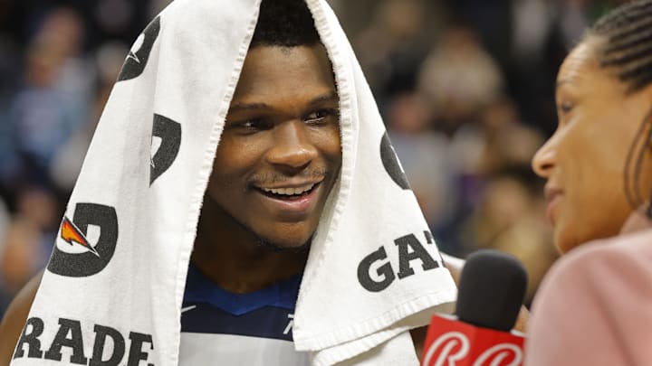 Jan 14, 2024; Minneapolis, Minnesota, USA; Minnesota Timberwolves guard Anthony Edwards (5) takes part in an interview after defeating the Los Angeles Clippers at Target Center. Mandatory Credit: Bruce Kluckhohn-Imagn Images