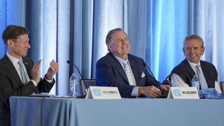 Dec 12, 2024; Chapel Hill, NC, USA;  North Carolina Tar Heels chancellor Lee Roberts, new head coach Bill Belichick and athletic director Bubba Cunningham at Loudermilk Center for Excellence. Mandatory Credit: Jim Dedmon-Imagn Images